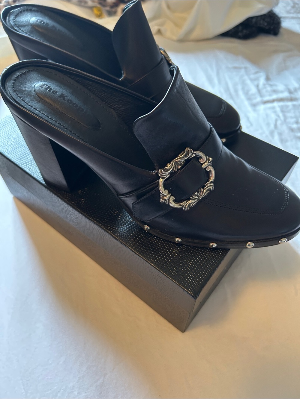 The Kooples Black Leather Block Heel Mules with Ornate Silver Buckle